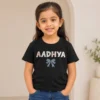 Personalised Aadhya girls black T-shirt with patterned custom name and decorative bow design