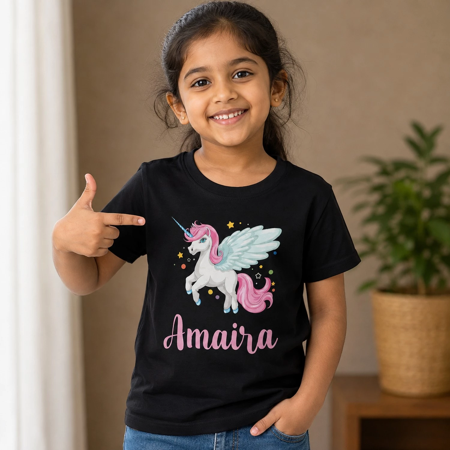 Personalised Amaira girls black T-shirt with colourful winged unicorn and custom name