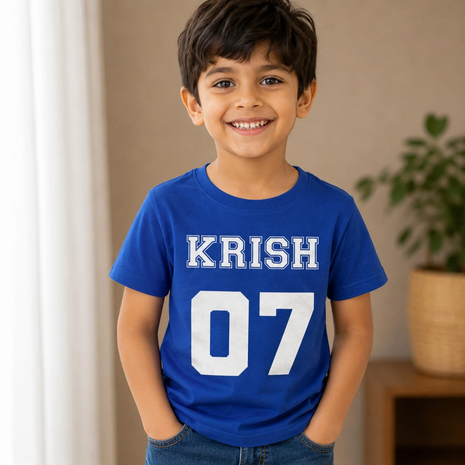 Personalised Krish boys blue T-shirt with varsity name and number 07 sports design