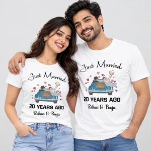 Indian couple wearing white Just Married 20 Years Ago anniversary T-shirts with blue wedding car illustration and Rohan & Pooja names.