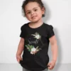 Child wearing black personalized cotton T shirt with floral frame and custom name print