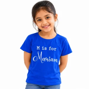 Young girl wearing a royal blue personalized kids T-shirt featuring white M is for lettering and the name Mariam in large decorative cursive script.