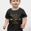 Baby wearing black cotton personalized Hello World name T shirt with custom gold print