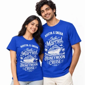 Indian couple wearing matching royal blue honeymoon cruise T-shirts featuring Aditya and Sneha names, Just Married lettering, a white cruise ship illustration, and Honeymoon Cruise 2026 text.
