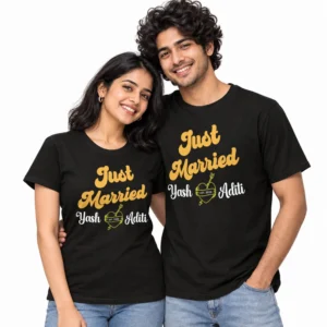 Indian couple wearing matching black Just Married T-shirts with golden yellow lettering, Yash and Aditi names in white, and a heart-and-arrow design marked EST. 2026.