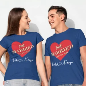 Newly married couple wearing personalized Just Married honeymoon matching T shirts with custom names in India