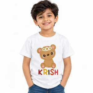 Young boy wearing a white personalized kids T-shirt featuring a cute brown teddy bear with a white daisy flower crown and colorful custom name KRISH.