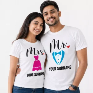 Smiling couple wearing matching white personalized Mr and Mrs T-shirts with custom surname text, suitable for husband and wife wedding or anniversary gift.