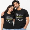 Indian couple wearing matching black personalized Mr. & Mrs. Agarwal T-shirts featuring elegant white decorative lettering, a large ampersand flourish, and yellow AGARWAL surname text.