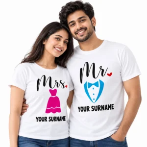 Couple wearing matching white Mr. and Mrs. personalized T-shirts with a pink wedding dress, blue tuxedo design, red hearts, and custom surname text.