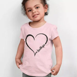 Child wearing pink personalized cotton T shirt with custom name inside heart design