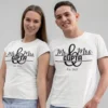 Couple wearing personalized Mr and Mrs matching T-shirts with surname and wedding year printed in minimal design