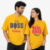 Couple wearing mustard yellow oversized T-shirts personalised with The Boss and The Real Boss designs and names