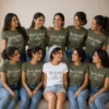 Bridal party wearing personalised olive green wedding T-shirts with Bridesmaid, Maid of Honor, Team Bride and family roles
