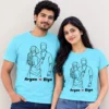 Couple wearing matching sky blue personalised line art T-shirts featuring a custom couple portrait and Aryan Riya names