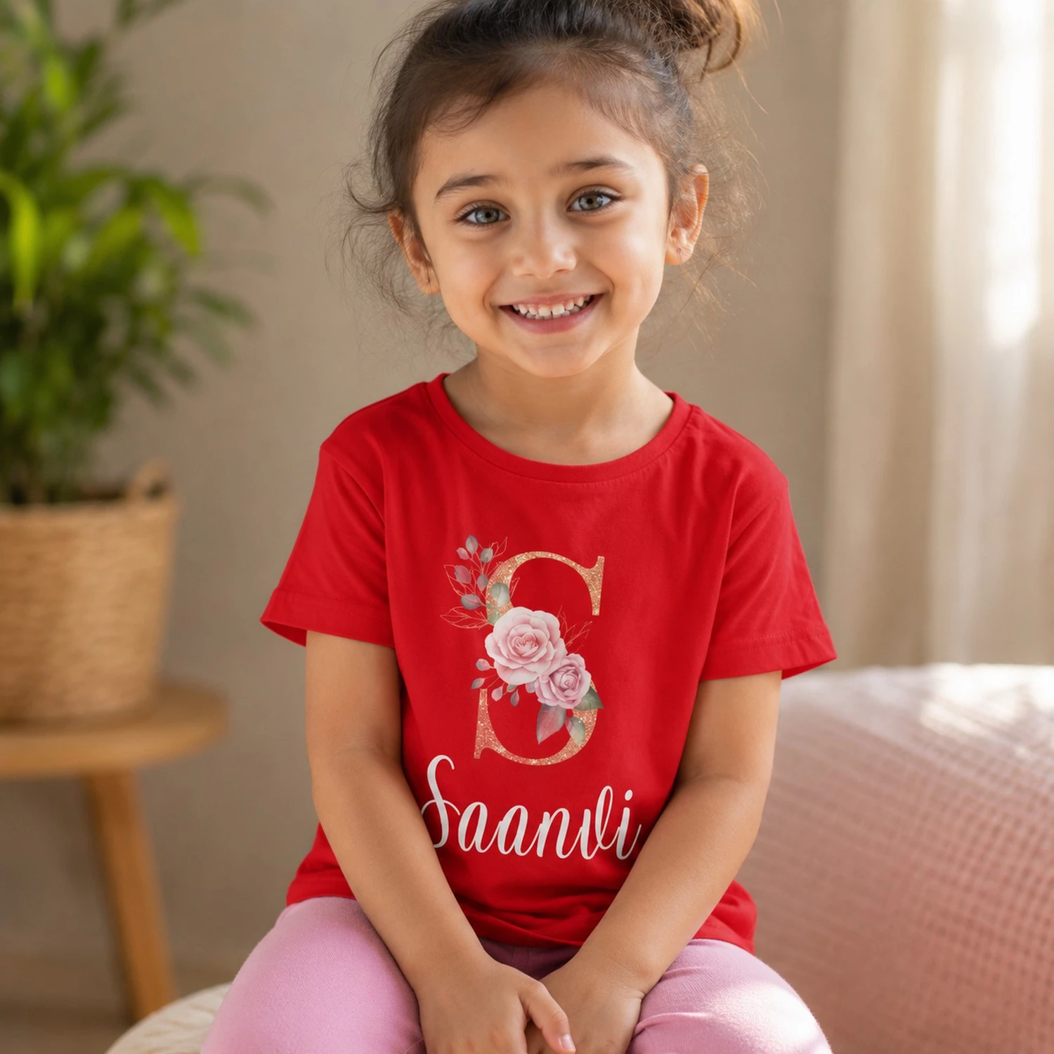Personalised red girls T-shirt with Saanvi name and floral S initial design