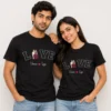Couple wearing matching black LOVE T-shirts personalised with an illustrated couple portrait and Vivaan Siya names