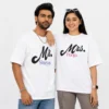 Couple wearing white personalised oversized unisex T-shirts with Mr Shreyas and Mrs Pooja custom name designs