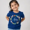 Personalised navy blue girls T-shirt with Avni name and colourful floral wreath