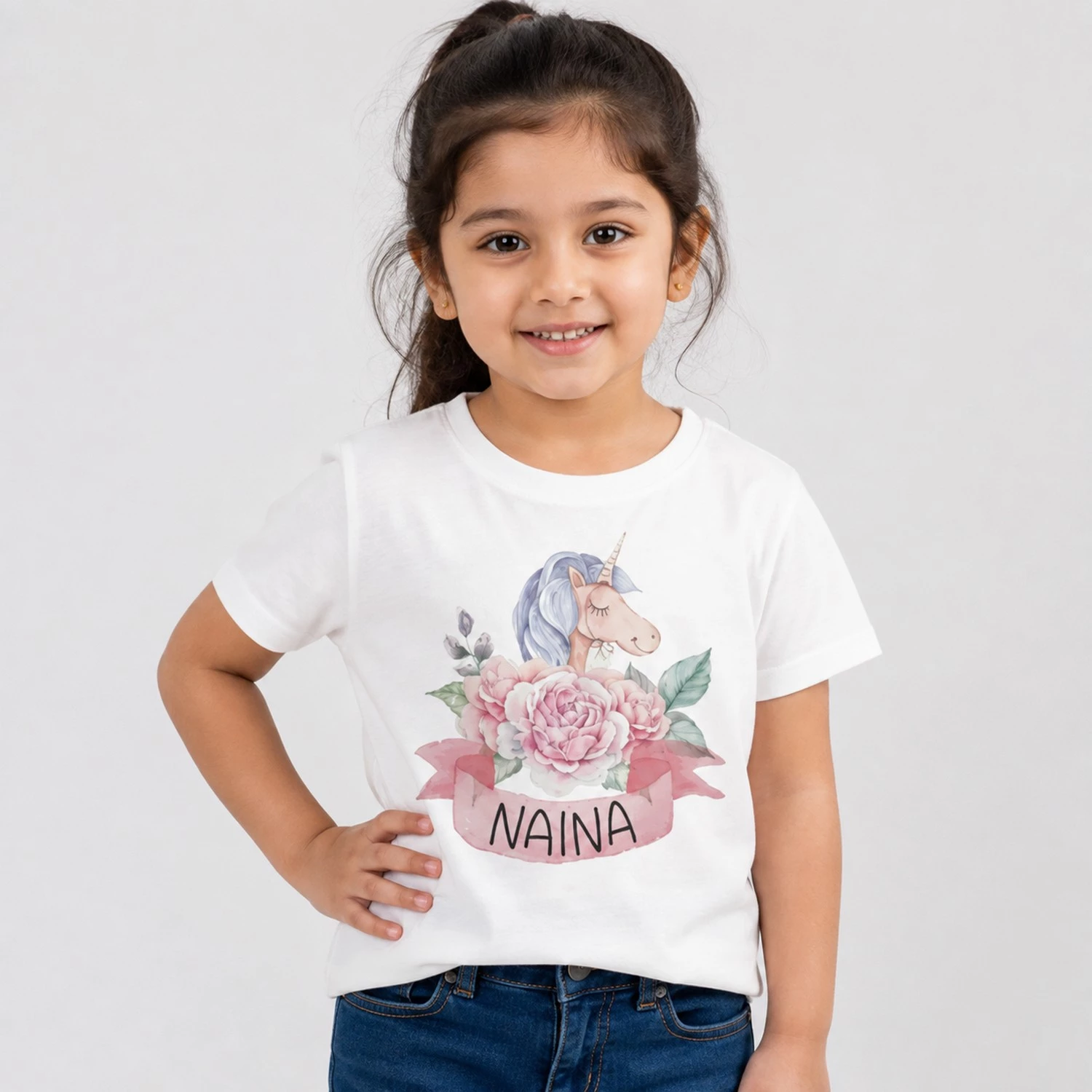 Personalised white girls T-shirt with Naina name, unicorn and pink floral design