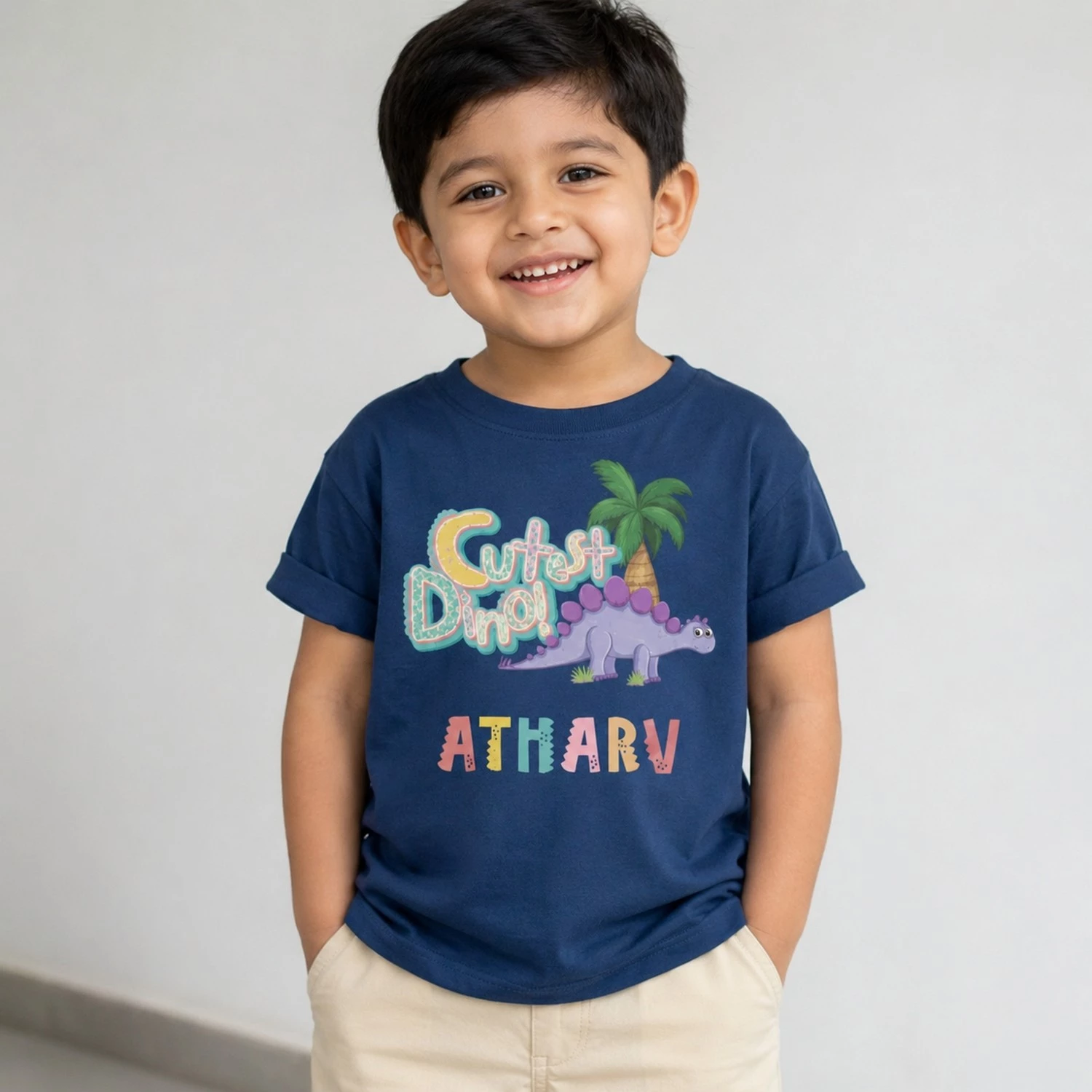 Personalised navy blue boys T-shirt with Cutest Dino Atharv dinosaur design