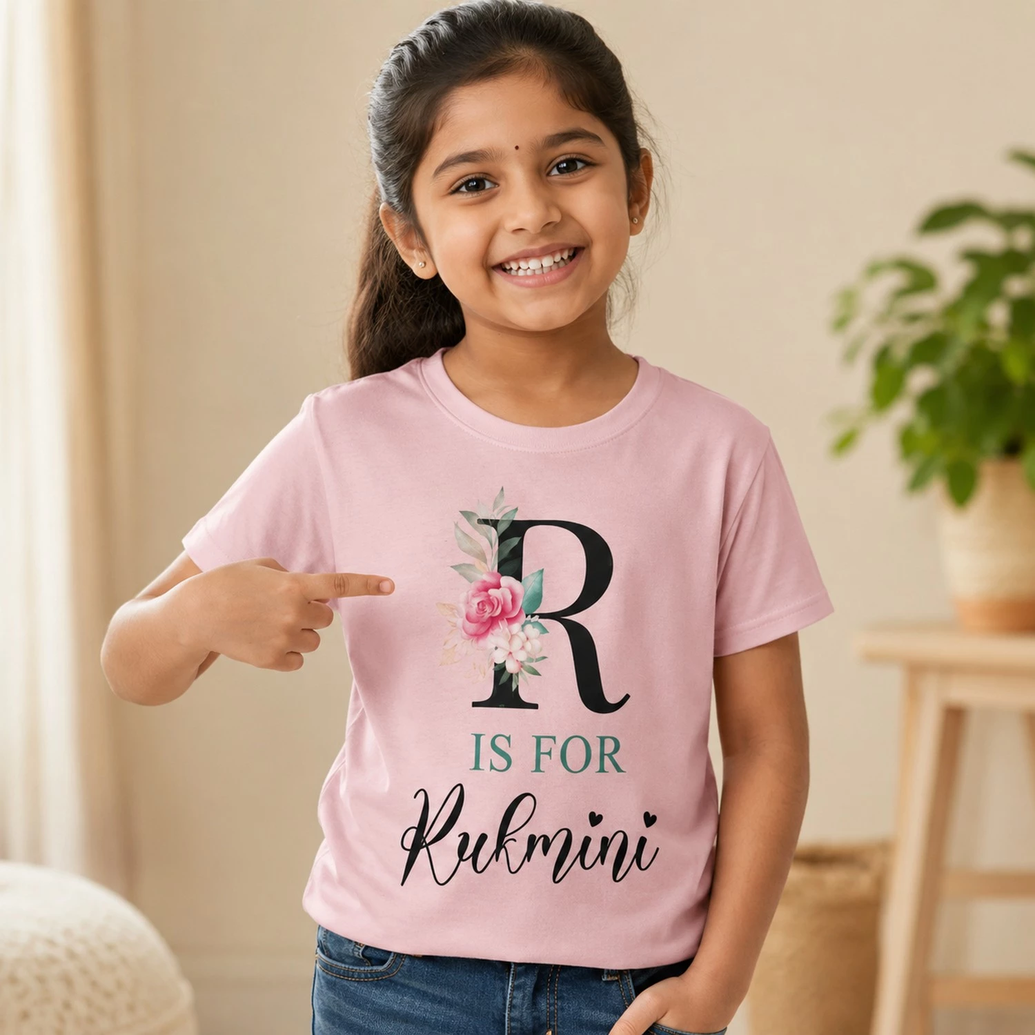 Personalised pink girls T-shirt with R is for Rukmini floral initial design