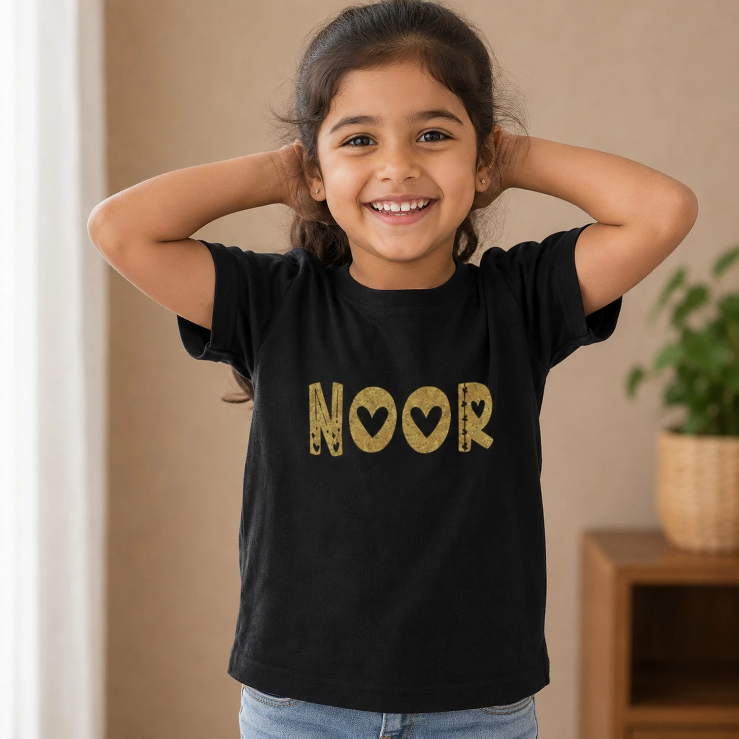 Personalised Noor girls black T-shirt with stylish gold custom name print
