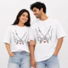 Couple wearing white oversized unisex T-shirts with pinky promise hand illustration, heart and personalised names