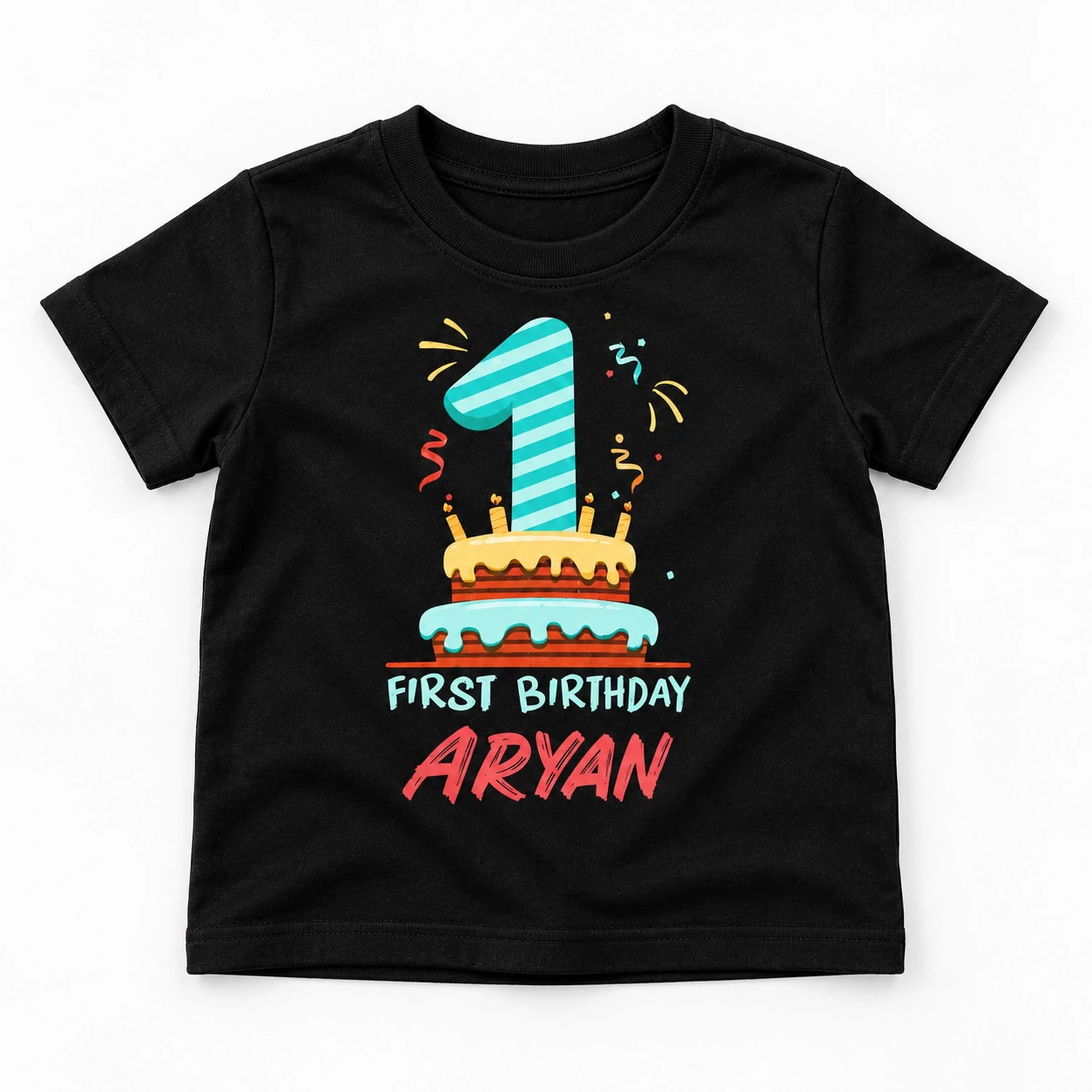 Flat lay of a black personalized 1st birthday kids t-shirt with number 1 cake print, First Birthday text, and the name Aryan.