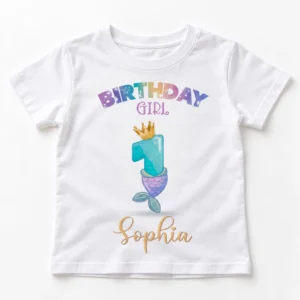 White personalized baby girl first birthday T-shirt displayed flat with colorful Birthday Girl lettering, crowned mermaid number 1 artwork, and Sophia name personalization.