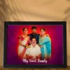 Custom family photo frame with personalized name and vibrant background design