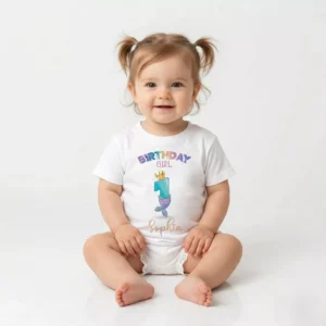 Baby wearing personalized cotton first birthday T shirt with custom name and number 1 design