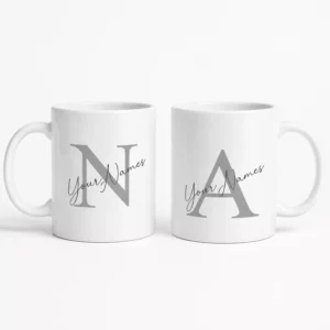 Personalized couple coffee mug set featuring large initial monograms and custom names on white mugs, designed as a husband and wife gift.