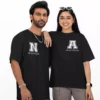 Personalized oversized couple T-shirts with custom initials and Roman numeral date printed on black matching couple tees