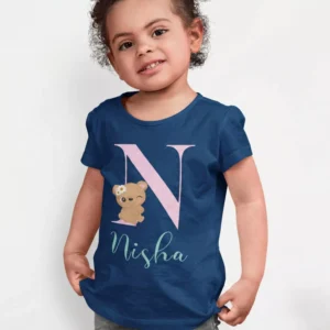 Kid wearing navy blue cotton T shirt with personalized initial letter and custom name print