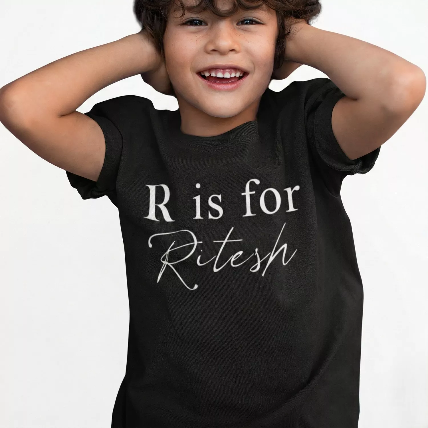 Child wearing black personalized cotton T shirt with custom name initial print design