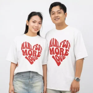 Personalized oversized couple t shirts with manifest more love heart design matching outfit for couples in white cotton oversized fit