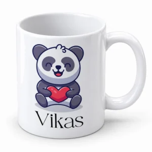 White personalized panda mug for kids with a smiling panda holding a red heart and the custom name Vikas underneath.