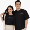 Couple wearing personalized oversized black t shirts with roman numeral anniversary date matching couple outfit