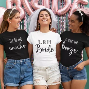 Bride and friends wearing matching bachelorette party t-shirts with fun typography quotes during a bridal celebration