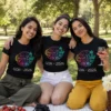 Three cousins wearing matching black Cousin Crew Goa 2026 T-shirts with colorful tropical vacation graphics