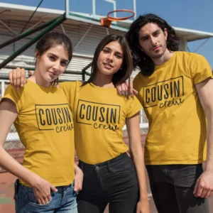Group of cousins wearing matching yellow Cousin Crew t-shirts at an outdoor court, perfect for family trips and coordinated outfits