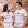 Couple wearing matching white hubby wifey personalized t-shirts with est year design for prewedding or anniversary photoshoot