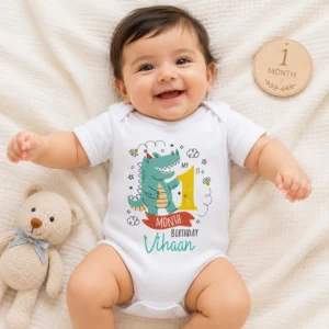 Baby wearing a personalized white onesie with dinosaur design and 1 month milestone text with custom name