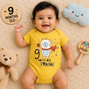 Baby wearing a personalized 9 months milestone onesie with cute bear design and custom name, ideal for baby photoshoot