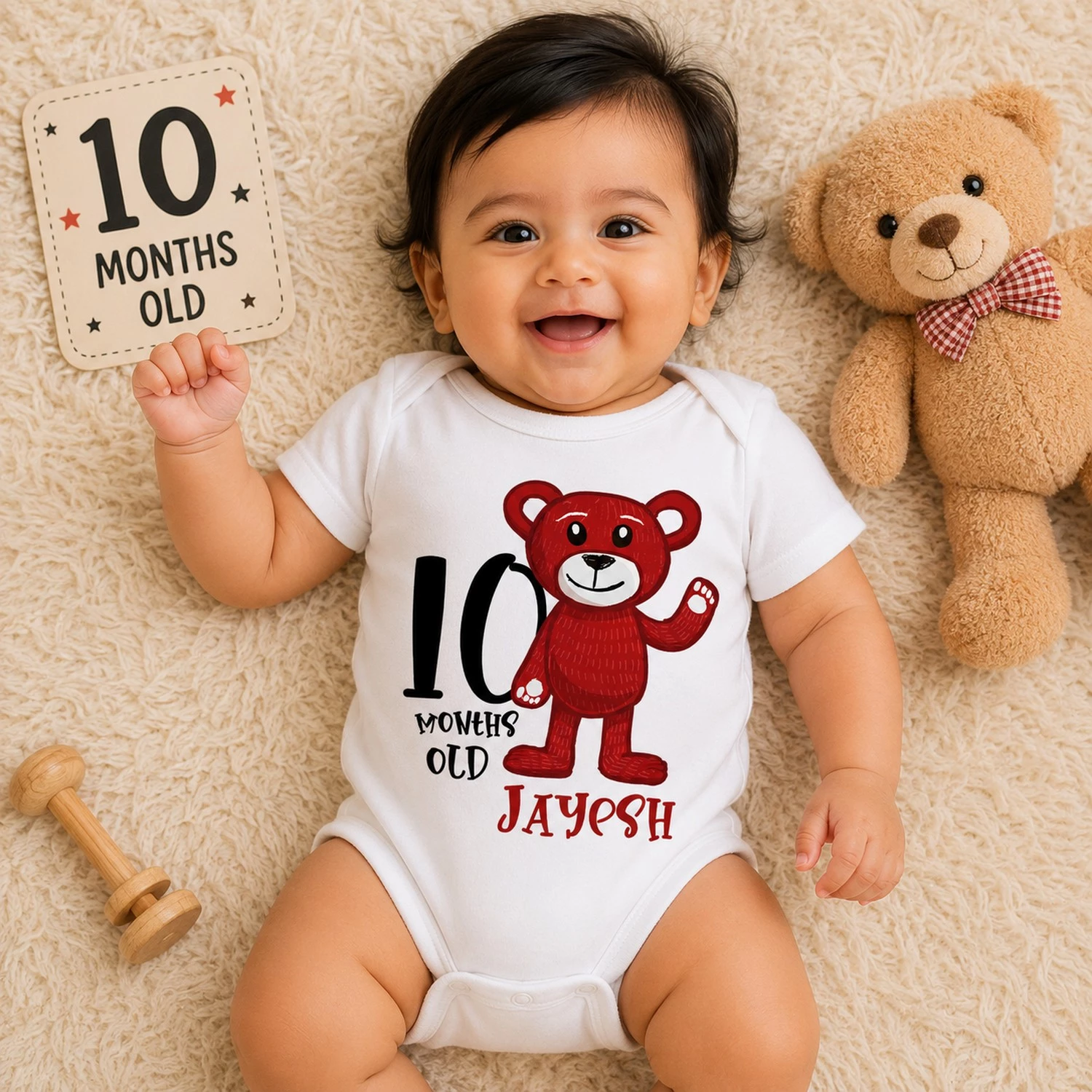 Baby wearing a personalized 10 months old onesie with teddy bear design and custom name printed on it