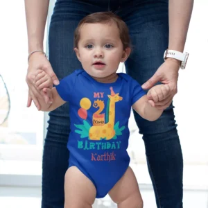 Baby wearing a blue personalized 2 month birthday onesie with giraffe design and custom name, ideal for milestone photoshoot