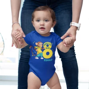 Baby wearing a personalized 8 month milestone blue onesie with cartoon monkey design and custom name printed