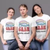 Three people wearing matching personalized Cousin Crew T-shirts with custom name printed, designed for family trips and group outings