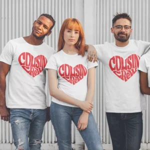Group of friends wearing matching white cousin crew t-shirts with red heart typography design, ideal for family trips and reunions